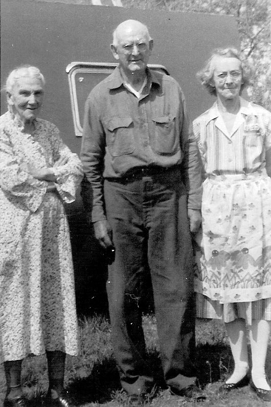 1952 Fred N Randall with sister Minnie Randall & 2nd wife, Marion (Snyder) in front of his home made travel trailer